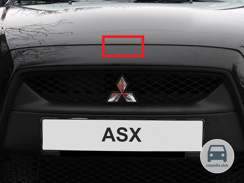 Расположение фиксатора открывания замка капота Mitsubishi ASX